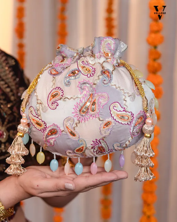 Sitara_Round_Potli_Bag_with_Pastel_Paisley_Embroidery_&_Pearl_Handle